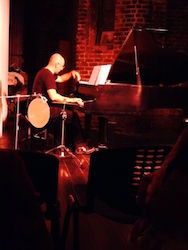 at the piano
